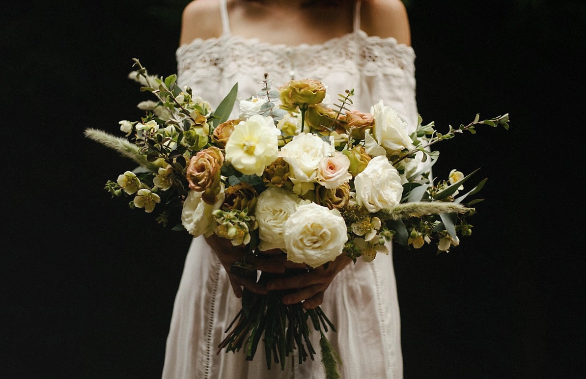 Delivery van outside the studio loaded with boxed bouquets